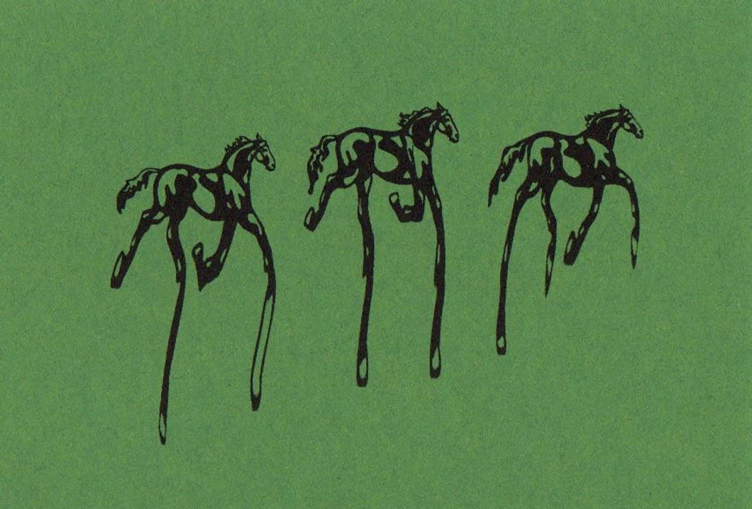 Three gestural black horses on green